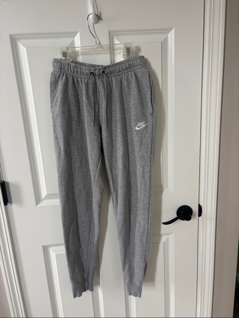 Women’s Nike Heather Gray Fleece Joggers with White Swoosh